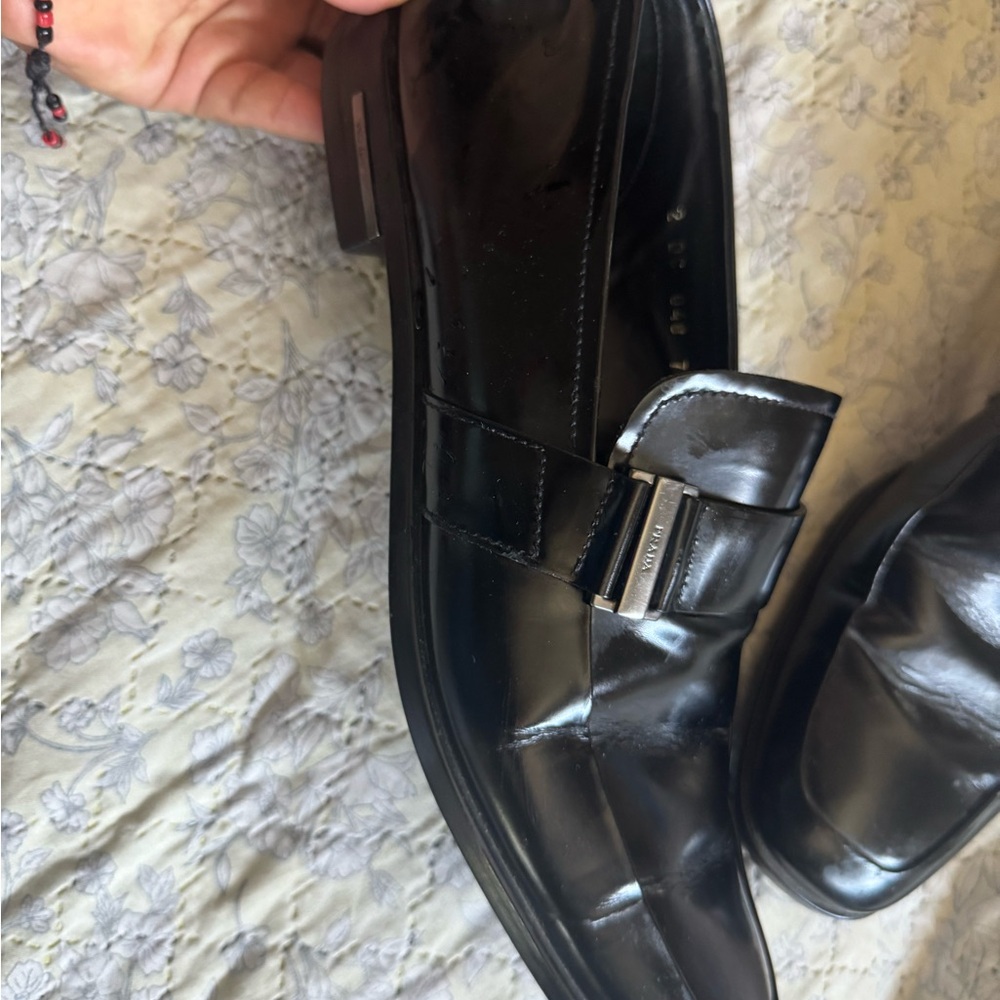 Prada Black Leather Loafers with Slip-On Design